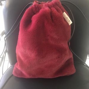Fuzzy drawstring back pack